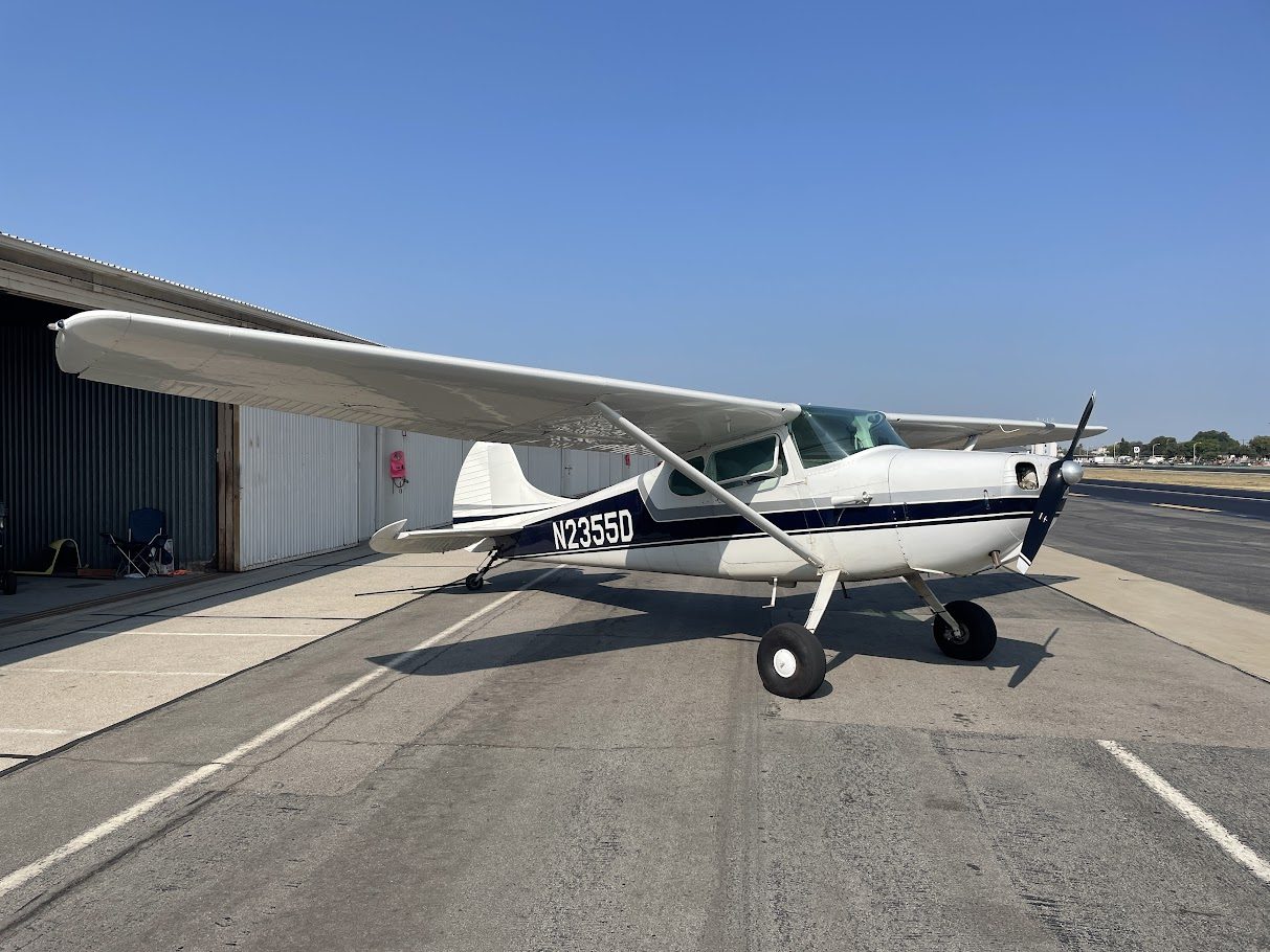 Cessna 170 N2355D parked by the hangar