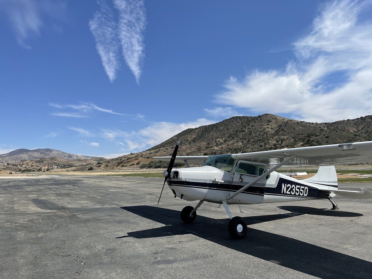 Cessna 170 on a backcountry mountain airstrip